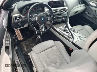 2016 BMW M6 z VIN WBS6G9C58GD931908, wystawiony jako Copart lot #72067214 z przebiegiem 84 170 mil mil oraz Szkody całkowita. Historia ofert i sprzedaży dostępna na DreamBid. Obrazek 8.