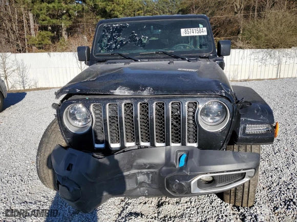 2023 Jeep Wrangler 4xe Sahara with VIN 1C4JJXP65PW585394, listed as a Copart auction lot 85741584 with 27,125 mi miles and Salvage Title. Bid and sale history available at carsss.com. Image 5.