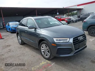 2018 Audi Q3 Premium Plus with VIN WA1HCCFS7JR019415, listed as a IAAI auction lot 41709593 with 59,445 mi miles. Bid and sale history available at carsss.com. Image 1.
