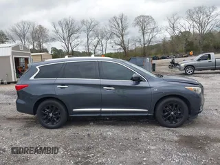 2014 Infiniti QX60 z VIN 5N1AL0MN3EC525993, wystawiony jako IAAI lot #41875586 z przebiegiem 141 867 mil mil oraz . Historia ofert i sprzedaży dostępna na DreamBid. Obrazek 13.