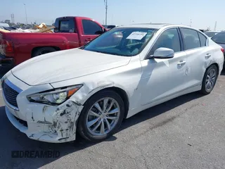 2015 Infiniti Q50 with VIN JN1BV7AP1FM333942, listed as a IAAI auction lot 42310734 with 111,592 mi miles and . Bid and sale history available at DreamBid. Image 6.