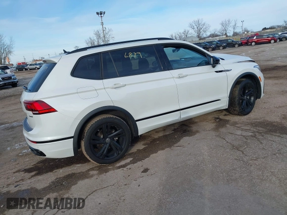 2023 Volkswagen Tiguan SE R-Line Black with VIN 3VV8B7AX9PM086225, listed as a IAAI auction lot 41276879 with Not provided miles and . Bid and sale history available at DreamBid. Image 4.