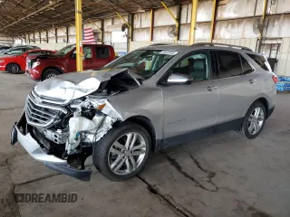 2019 Chevrolet Equinox Premier z VIN 3GNAXYEX3KS592663, wystawiony jako Copart lot #59635385 z przebiegiem 70 575 mil mil oraz Szkoda całkowita • Salvage title. Historia ofert i sprzedaży dostępna na DreamBid. Obrazek 1.