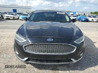 2019 Ford Fusion Titanium with VIN 3FA6P0D97KR184134, listed as a Copart auction lot 50913245 with 128,888 mi miles and Clean Title. Bid and sale history available at carsss.com. Image 5.