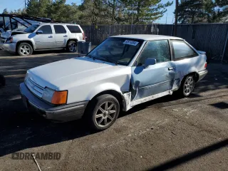 1989 Ford Escort z VIN 1FAPP9090KW279114, wystawiony jako Copart lot #83614994 z przebiegiem 60 585 mil mil oraz Nie do naprawy. Historia ofert i sprzedaży dostępna na DreamBid. Obrazek 1.