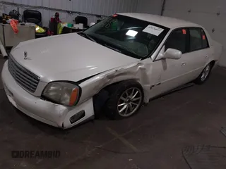 2003 Cadillac DeVille with VIN 1G6KD54Y63U178022, listed as a IAAI auction lot 42076667 with 141,863 mi miles. Bid and sale history available at carsss.com. Image 17.