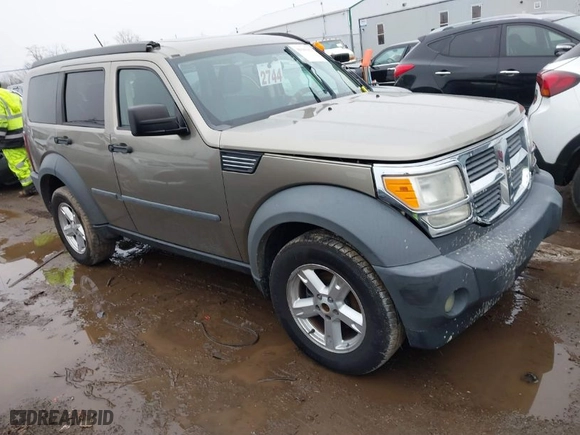 2007 Dodge Nitro SXT with VIN 1D8GU28K37W554484, listed as a IAAI auction lot 41565252 with 156,717 mi miles. Bid and sale history available at carsss.com. Image 1.