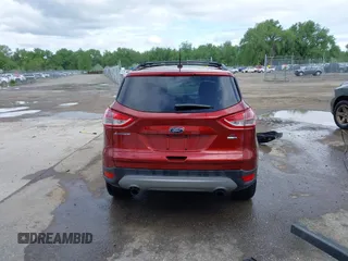 2014 Ford Escape SE z VIN 1FMCU9GX8EUB98766, wystawiony jako IAAI lot #42256143 z przebiegiem 64 074 mil mil oraz . Historia ofert i sprzedaży dostępna na DreamBid. Obrazek 17.