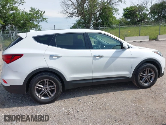2017 Hyundai Santa Fe 2.4L with VIN 5NMZTDLB5HH018198, listed as a IAAI auction lot 42523632 with 144,883 mi miles and . Bid and sale history available at DreamBid. Image 14.