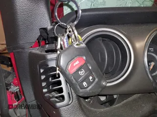 2019 Jeep Wrangler Sport S with VIN 1C4GJXAG4KW646013, listed as a IAAI auction lot 41556750 with 44,911 mi miles and . Bid and sale history available at DreamBid. Image 11.