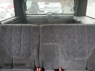 1998 GMC Jimmy SLE with VIN 1GKDT13W6W2535592, listed as a Copart auction lot 81953844 with 88,205 mi miles and Salvage Title. Bid and sale history available at carsss.com. Image 10.