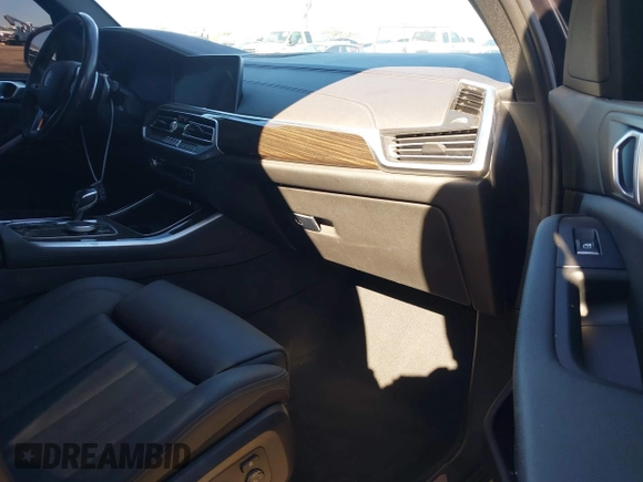 2021 BMW X5 sDrive40i with VIN 5UXCR4C08M9E15642, listed as a IAAI auction lot 41377524 with 76,050 mi miles. Bid and sale history available at carsss.com. Image 5.