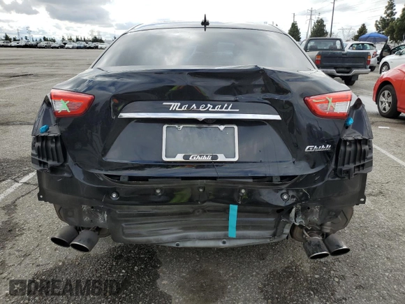 2015 Maserati Ghibli z VIN ZAM57XSA7F1148872, wystawiony jako Copart lot #48454165 z przebiegiem 72 232 mil mil oraz Szkoda całkowita • Salvage title. Historia ofert i sprzedaży dostępna na DreamBid. Obrazek 6.