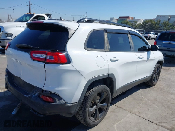 2016 Jeep Cherokee 75th Anniversary with VIN 1C4PJLCB9GW107422, listed as a IAAI auction lot 41997941 with 121,641 mi miles and . Bid and sale history available at DreamBid. Image 4.
