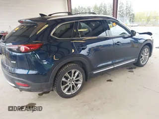 2018 Mazda CX-9 Grand Touring with VIN JM3TCBDY0J0216195, listed as a IAAI auction lot 41976122 with 90,083 mi miles and . Bid and sale history available at carsss.com. Image 4.