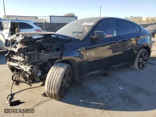2012 BMW X6 M with VIN 5YMGZ0C59CLK14863, listed as a Copart auction lot 87869855 with 0 mi miles and Salvage Title. Bid and sale history available at carsss.com. Image 1.