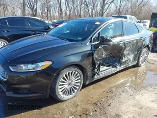 2013 Ford Fusion Titanium Hybrid with VIN 3FA6P0RU5DR339716, listed as a IAAI auction lot 41405835 with 197,840 mi miles. Bid and sale history available at carsss.com. Image 6.