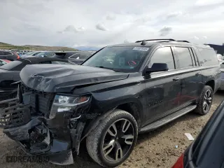 2019 Chevrolet Suburban LT with VIN 1GNSKHKC5KR291660, listed as a Copart auction lot 51587645 with 107,786 mi miles and Salvage Title. Bid and sale history available at carsss.com. Image 1.