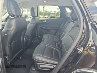 2021 Ford Escape SEL Hybrid with VIN 1FMCU0CZ4MUA54097, listed as a IAAI auction lot 42566428 with 45,342 mi miles and . Bid and sale history available at DreamBid. Image 16.