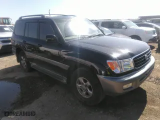 2001 Toyota Land Cruiser with VIN JTEHT05J512016563, listed as a IAAI auction lot 41868193 with 247,653 mi miles. Bid and sale history available at carsss.com. Image 1.