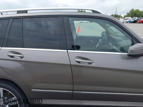 2014 Mercedes-Benz GLK 350 with VIN WDCGG5HB0EG326077, listed as a IAAI auction lot 42041401 with 122,087 mi miles and . Bid and sale history available at DreamBid. Image 13.