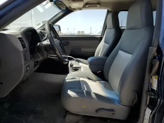 2004 GMC Canyon SLE Z71 with VIN 1GTDS196248166987, listed as a Copart auction lot 49807435 with 166,408 mi miles and Salvage Title. Bid and sale history available at carsss.com. Image 7.