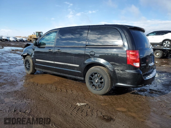 2014 Ram Cargo Van Tradesman with VIN 2C4JRGAG2ER203094, listed as a Copart auction lot 82061554 with 72,464 mi miles and Salvage Title. Bid and sale history available at carsss.com. Image 2.