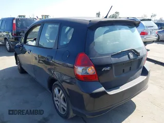2007 Honda Fit Sport with VIN JHMGD37637S005754, listed as a IAAI auction lot 42663714 with 239,000 mi miles and . Bid and sale history available at DreamBid. Image 3.