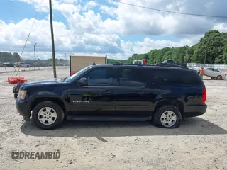 2010 Chevrolet Suburban LT z VIN 1GNUCJE08AR192831, wystawiony jako IAAI lot #42534754 z przebiegiem 165 741 mil mil oraz . Historia ofert i sprzedaży dostępna na DreamBid. Obrazek 14.