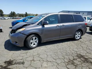 2015 Toyota Sienna LE AAS with VIN 5TDKK3DC4FS667488, listed as a Copart auction lot 60462545 with 188,575 mi miles and Salvage title. Bid and sale history available at DreamBid. Image 1.