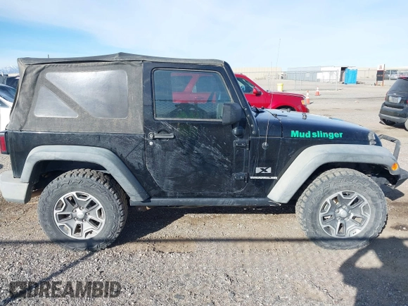 2009 Jeep Wrangler X with VIN 1J4FA24159L768617, listed as a IAAI auction lot 41686830 with 100,478 mi miles and . Bid and sale history available at DreamBid. Image 13.