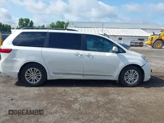 2016 Toyota Sienna XLE with VIN 5TDYK3DC4GS748888, listed as a IAAI auction lot 42605968 with 164,811 mi miles and . Bid and sale history available at DreamBid. Image 13.