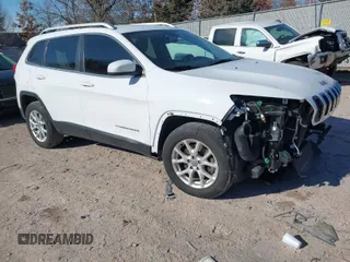 2016 Jeep Cherokee Latitude z VIN 1C4PJMCSXGW134960, wystawiony jako IAAI lot #41542436 z przebiegiem 117 501 mil mil oraz . Historia ofert i sprzedaży dostępna na DreamBid. Obrazek 1.