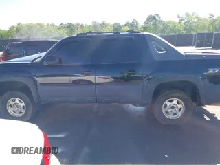 2002 Chevrolet Avalanche with VIN 3GNEK13T42G142319, listed as a IAAI auction lot 41977733 with Not Provided miles and . Bid and sale history available at DreamBid. Image 14.