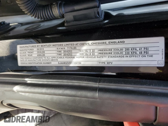 2019 Bentley Bentayga V8 z VIN SJAAM2ZV5KC024154, wystawiony jako Copart lot #74990344 z przebiegiem 41 589 mil mil oraz Szkoda całkowita • Salvage title. Historia ofert i sprzedaży dostępna na DreamBid. Obrazek 14.