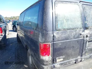 1999 Ford Econoline Cargo with VIN 1FTRE1422XHA33460, listed as a IAAI auction lot 41326443 with 119,294 mi miles. Bid and sale history available at carsss.com. Image 3.