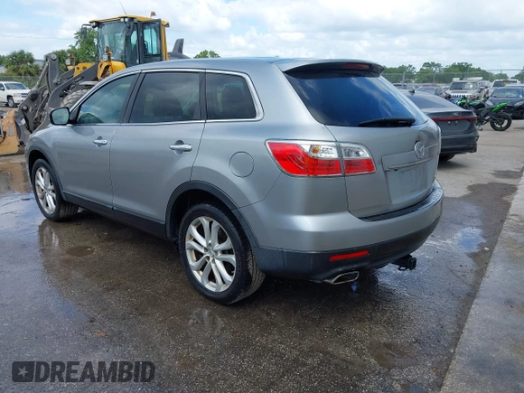 2011 Mazda CX-9 Grand Touring with VIN JM3TB2DA8B0307271, listed as a IAAI auction lot 41896962 with 144,624 mi miles and . Bid and sale history available at DreamBid. Image 3.