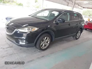 2014 Mazda CX-9 Touring with VIN JM3TB2CA2E0446267, listed as a IAAI auction lot 42196512 with 98,670 mi miles and . Bid and sale history available at carsss.com. Image 2.