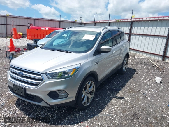 2017 Ford Escape Titanium with VIN 1FMCU0J99HUB23567, listed as a IAAI auction lot 42127795 with 93,056 mi miles. Bid and sale history available at carsss.com. Image 17.
