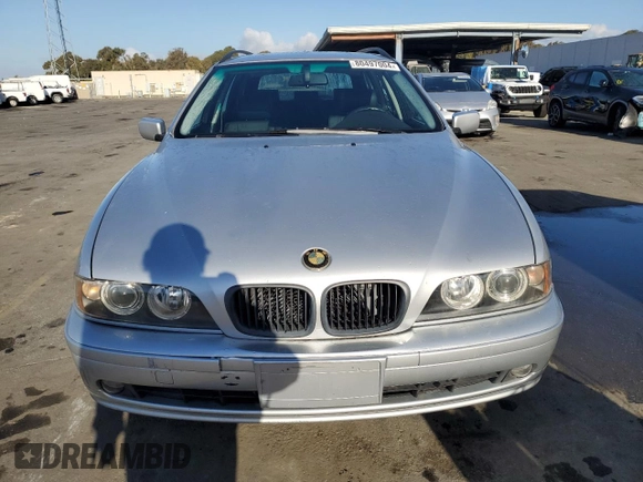 2003 BMW 5 Series 525iAT with VIN WBADS43463GE11741, listed as a Copart auction lot 80497004 with 166,198 mi miles and Clean Title. Bid and sale history available at carsss.com. Image 5.