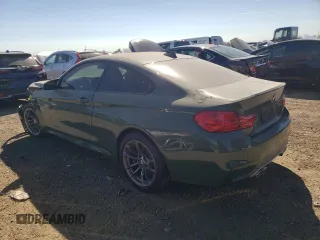 2015 BMW M4 with VIN WBS3R9C56FK333498, listed as a Copart auction lot 72363514 with 11,065 mi miles and Salvage Title. Bid and sale history available at carsss.com. Image 2.