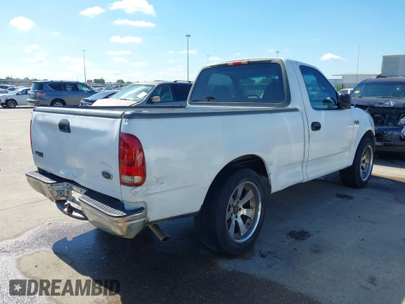 2000 Ford F-150 with VIN 1FTZF1728YKA54035, listed as a IAAI auction lot 42236191 with Not provided miles and . Bid and sale history available at DreamBid. Image 4.