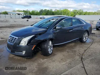 2013 Cadillac XTS Luxury z VIN 2G61P5S34D9159591, wystawiony jako Copart lot #55729445 z przebiegiem 156 579 mil mil oraz Nie do naprawy. Historia ofert i sprzedaży dostępna na DreamBid. Obrazek 1.