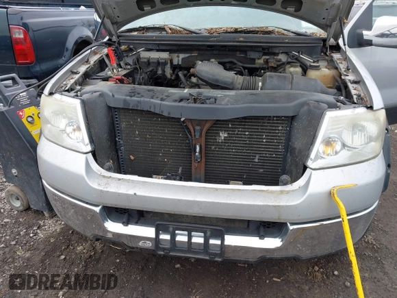 2005 Ford F-150 XL with VIN 1FTRF12W85NC00664, listed as a IAAI auction lot 42046282 with 167,105 mi miles. Bid and sale history available at carsss.com. Image 6.