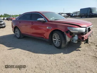 2014 Ford Taurus Limited z VIN 1FAHP2F82EG141034, wystawiony jako Copart lot #52579995 z przebiegiem 207 709 mil mil oraz Szkoda całkowita • Salvage title. Historia ofert i sprzedaży dostępna na DreamBid. Obrazek 4.