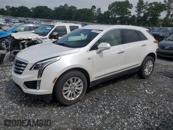 2018 Cadillac XT5 FWD with VIN 1GYKNARS1JZ222767, listed as a Copart auction lot 57989015 with 33,464 mi miles and Salvage title. Bid and sale history available at DreamBid. Image 1.