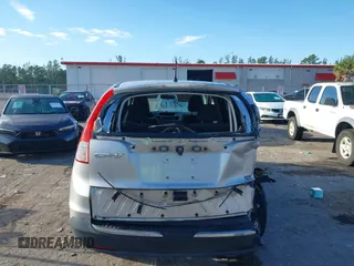 2014 Honda CR-V LX with VIN 3CZRM3H35EG708060, listed as a IAAI auction lot 41761003 with 142,954 mi miles. Bid and sale history available at carsss.com. Image 16.
