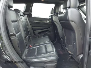 2014 Jeep Grand Cherokee Limited with VIN 1C4RJFBG4EC220054, listed as a IAAI auction lot 42050036 with 100,552 mi miles and . Bid and sale history available at DreamBid. Image 8.