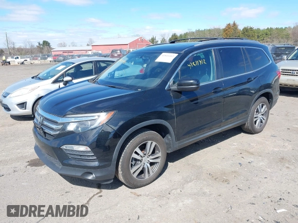 2016 Honda Pilot EX-L with VIN 5FNYF5H57GB023852, listed as a IAAI auction lot 41811412 with 151,707 mi miles and . Bid and sale history available at DreamBid. Image 17.