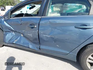 2015 Hyundai Sonata SE z VIN 5NPE24AF6FH105910, wystawiony jako IAAI lot #42272532 z przebiegiem Nie podano mil oraz . Historia ofert i sprzedaży dostępna na DreamBid. Obrazek 13.